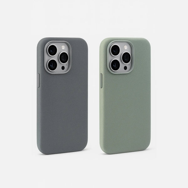 Two fabric iPhone cases, one gray and one sage green, on a white background