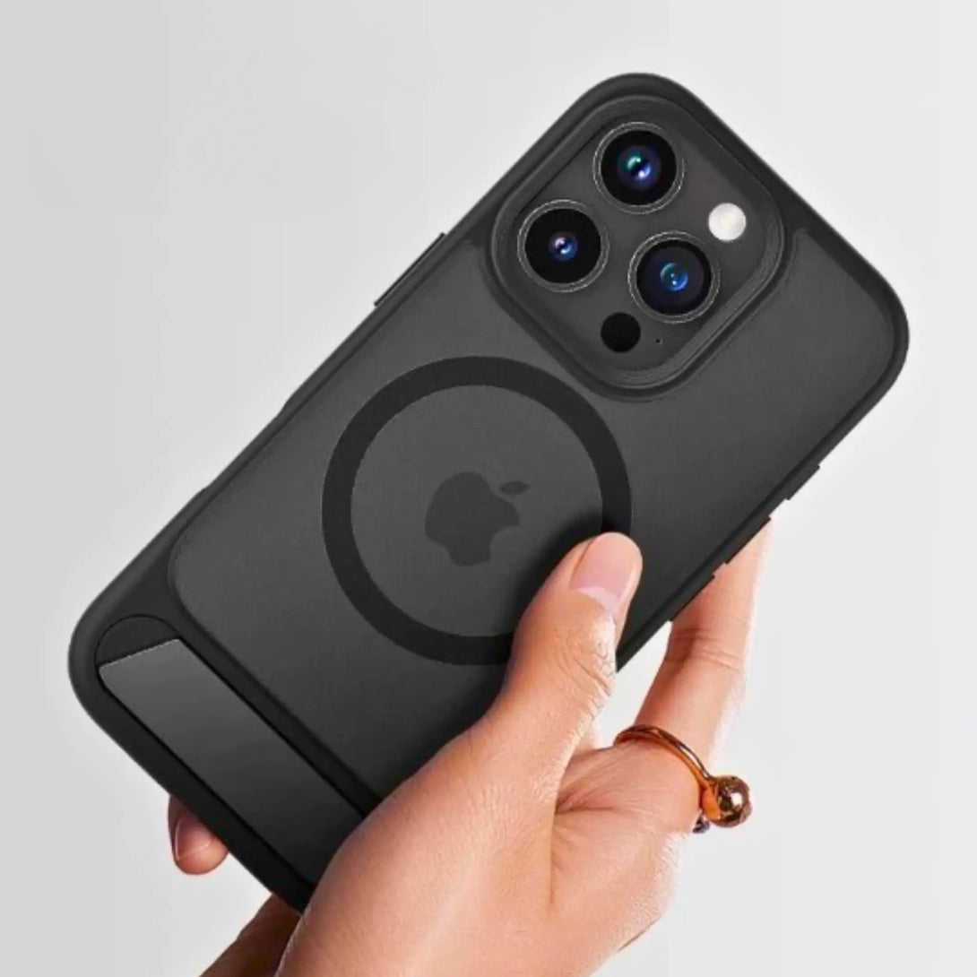 Hand holding a black Transparent iPhone case showing apple logo on a light gray background