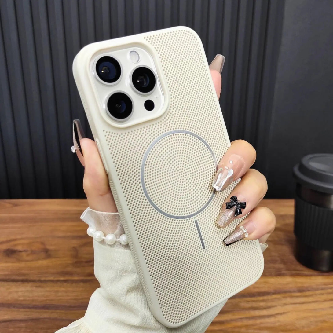 Hand holding a phone with a textured case on a wooden surface