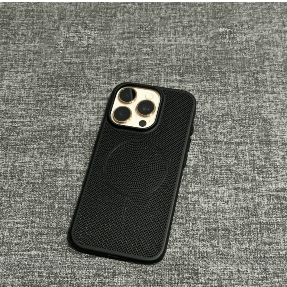 Black non slip iPhone case on a gray textured surface