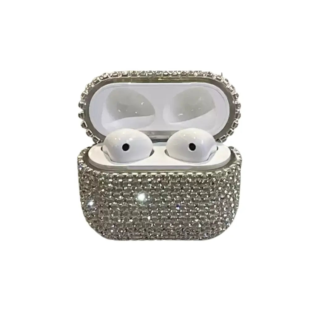 Rhinestone AirPods case in silver shown open with earbuds inside the charging case