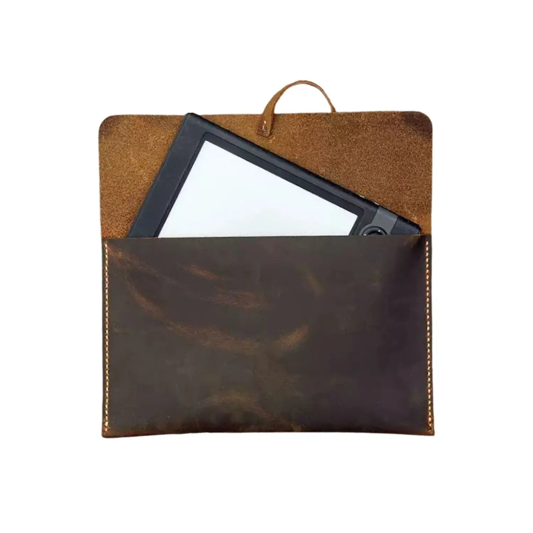 Genuine cowhide Kindle sleeve open with Kindle sliding out showing rough-out suede interior lining