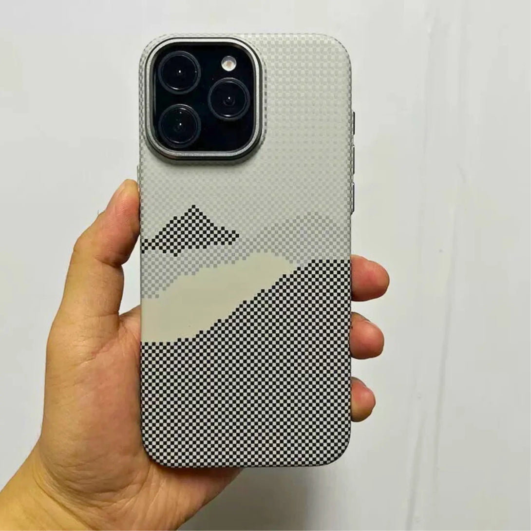 Grey and white iPhone case with pixel pattern design held by a hand