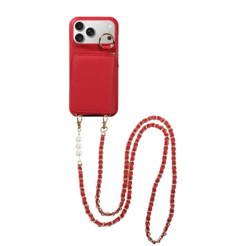 iPhone case with pearl chain crossbody strap in red flat lay view