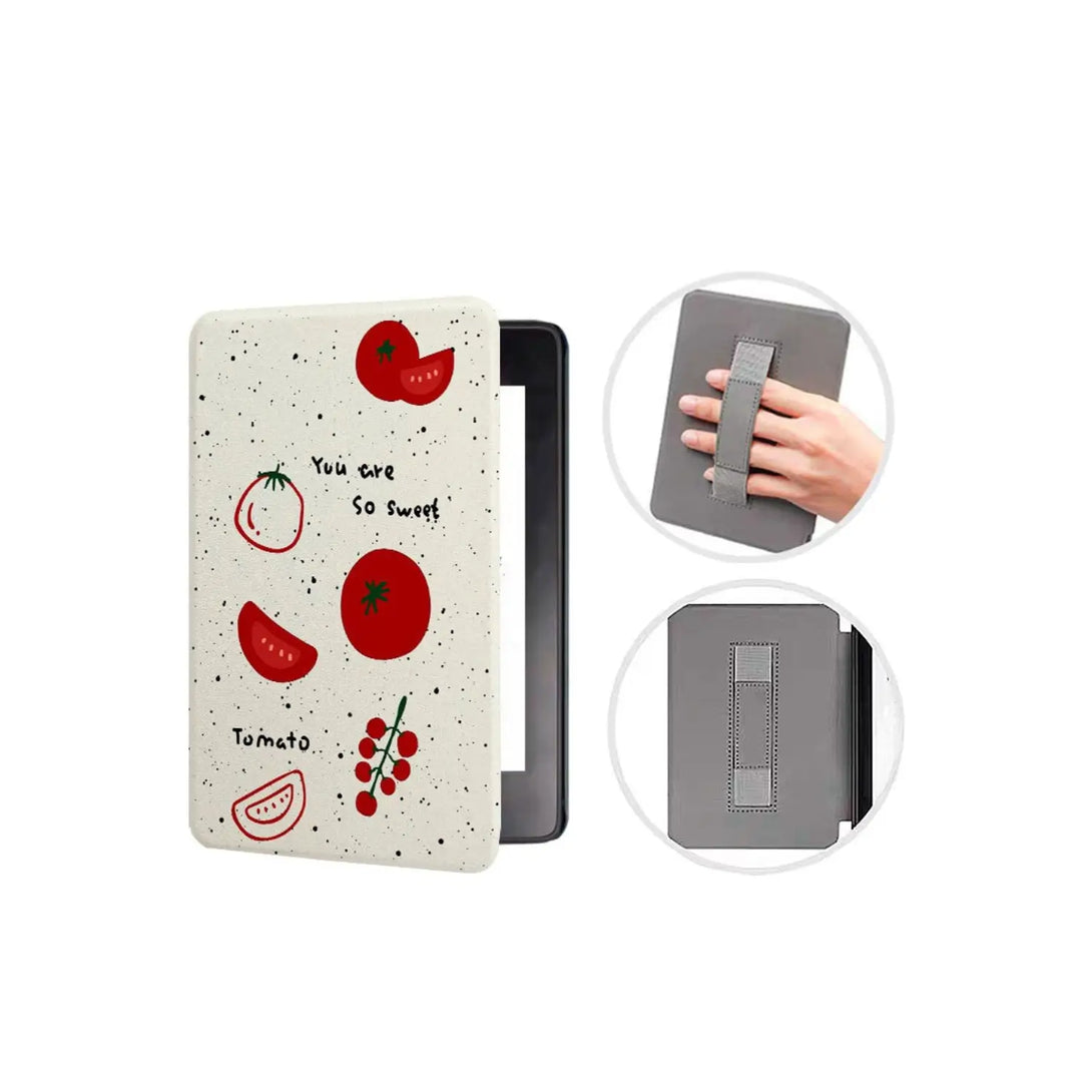 Kawaii print magnetic Kindle case front view with tomato design on cream cover, hand strap detail insets visible