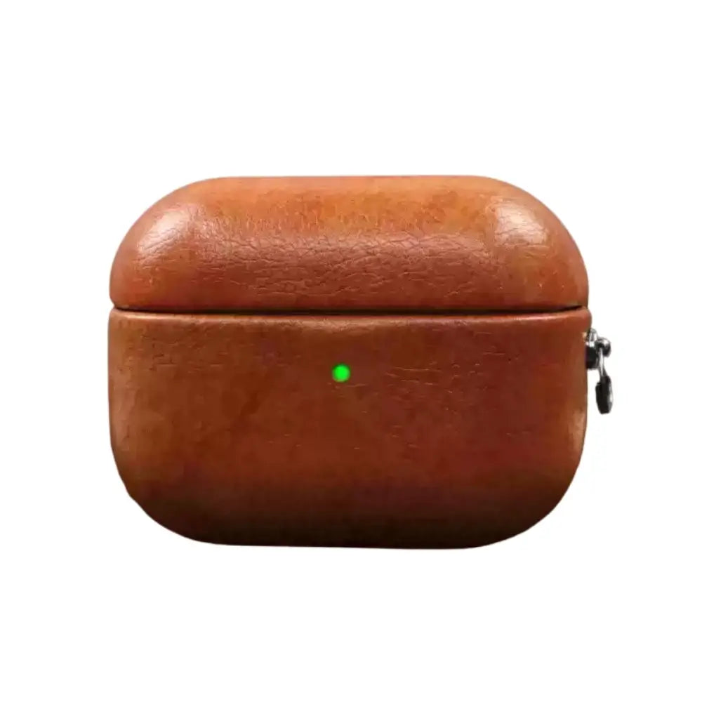 Oil wax leather AirPods case in brown with metal carabiner clip and green charging LED, front view