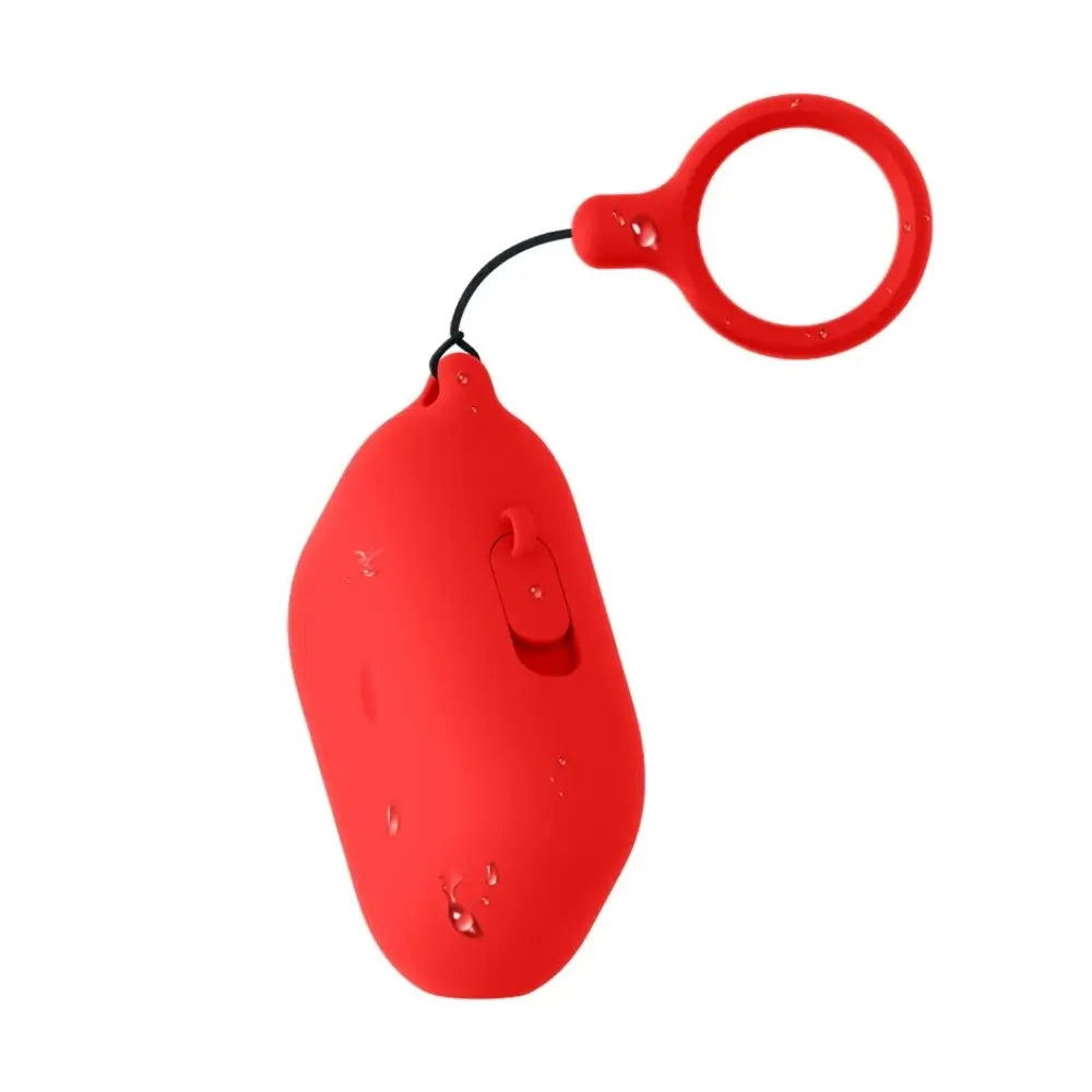 Silicone AirPods case with keyring in red — front view showing detachable silicone ring loop on braided cord