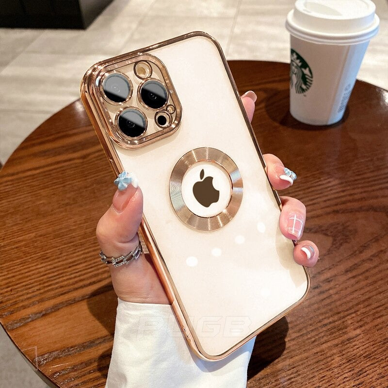 A hand holding a gold clear case on iPhone